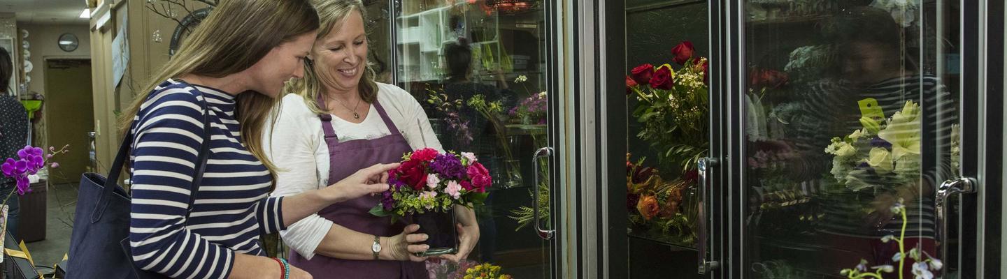 Florist interacting with a customer